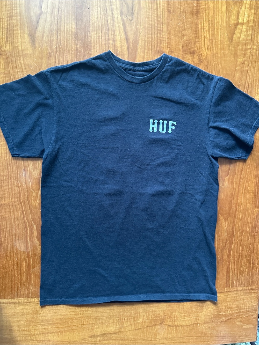 HUF essentials Black Tee with H logo on back